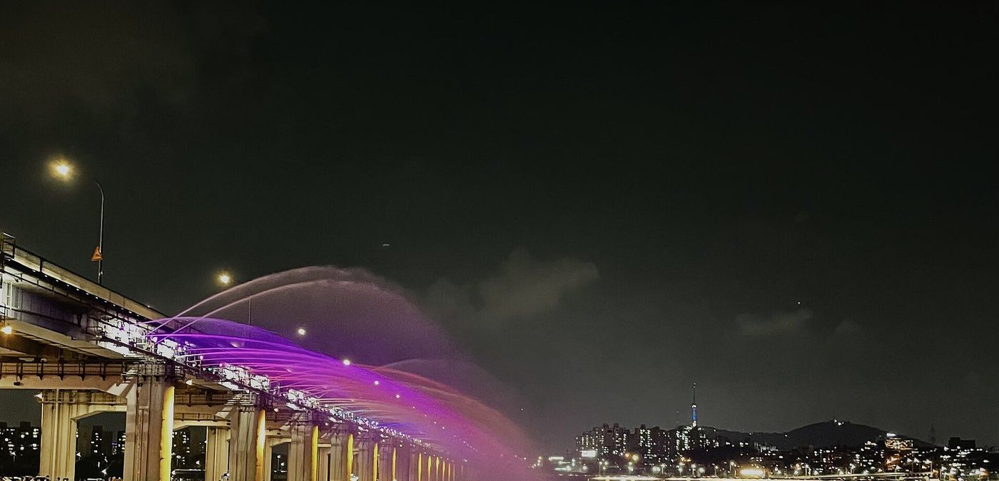 Banpo Bridge Moonlight Rainbow Fountain lit at night over the Han River
