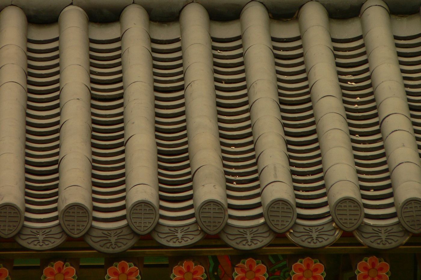 Rows of curved roof tiles on a palace roof
