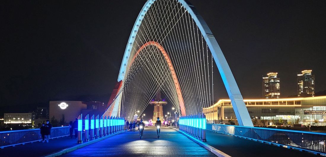 Expo Bridge in Daejeon lit blue and red at night
